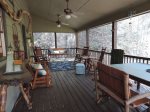 Large Screened in Porch over looking the Coosawattee River. Porch Swing, Table & Chairs